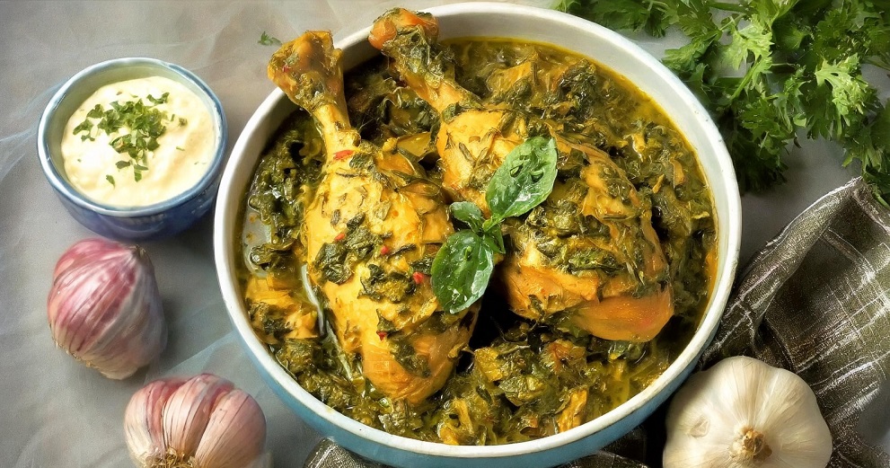 image of methi chicken recipe on kitchen table